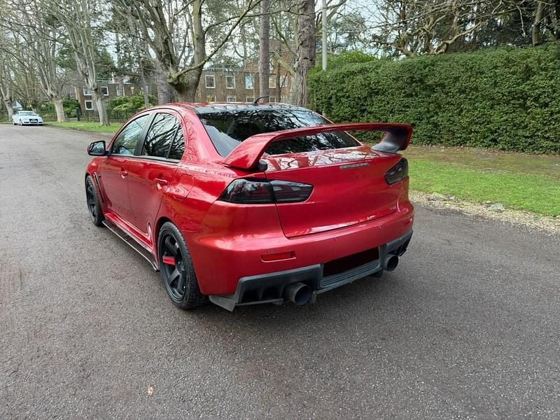 Used Mitsubishi Lancer 470 HP (345 kW) 2009 Red Sedan