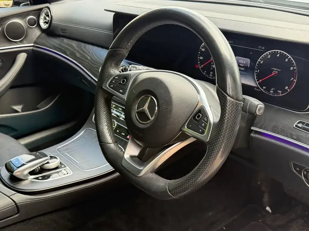 Used Mercedes E400 AMG Line Premium 333 HP (244 kW) 2017 Silver Coupe