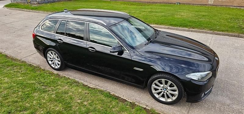 Używany BMW 520 Comfort Edition 181 KM (133 kW) 2014 Czarny Kombi