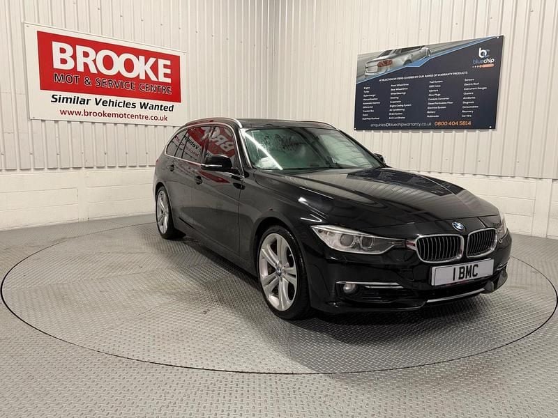 Black Used 2014 BMW 330 Luxury Line Estate | £8,490 (Good price) - Image 1/3