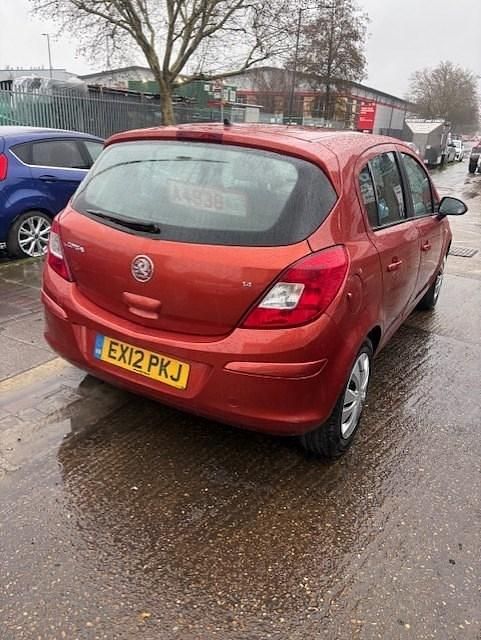 Second-hand Vauxhall Corsa 100 CP (73 kW) 2012 Portocaliu Hatchback