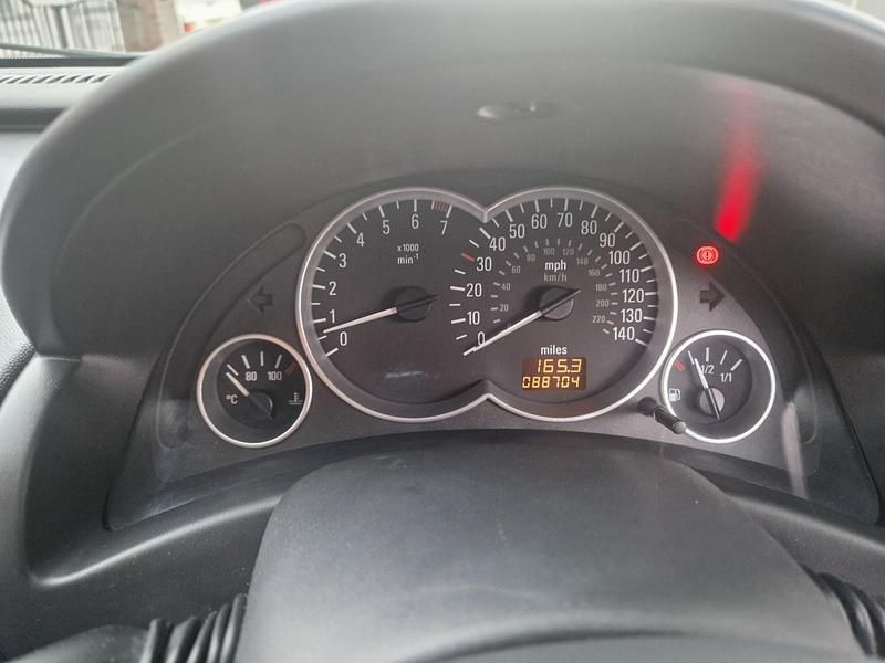 Second-hand Vauxhall Tigra Sport 90 CP (66 kW) 2006 Albastru Cabrio