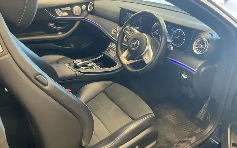 Used Mercedes E220 AMG line 194 HP (142 kW) 2019 Blue Coupe