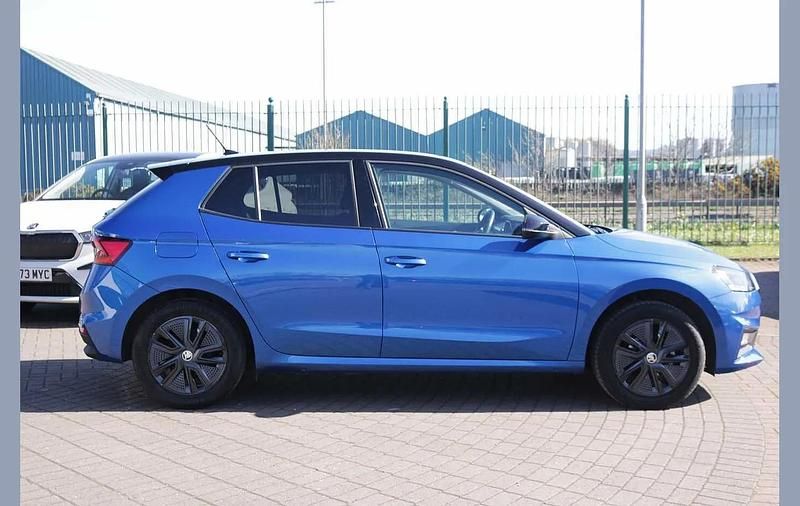 Used Skoda Fabia Colour Edition 94 HP (69 kW) 2023 Race blue metallic black body / magic pearl effect roof Hatchback