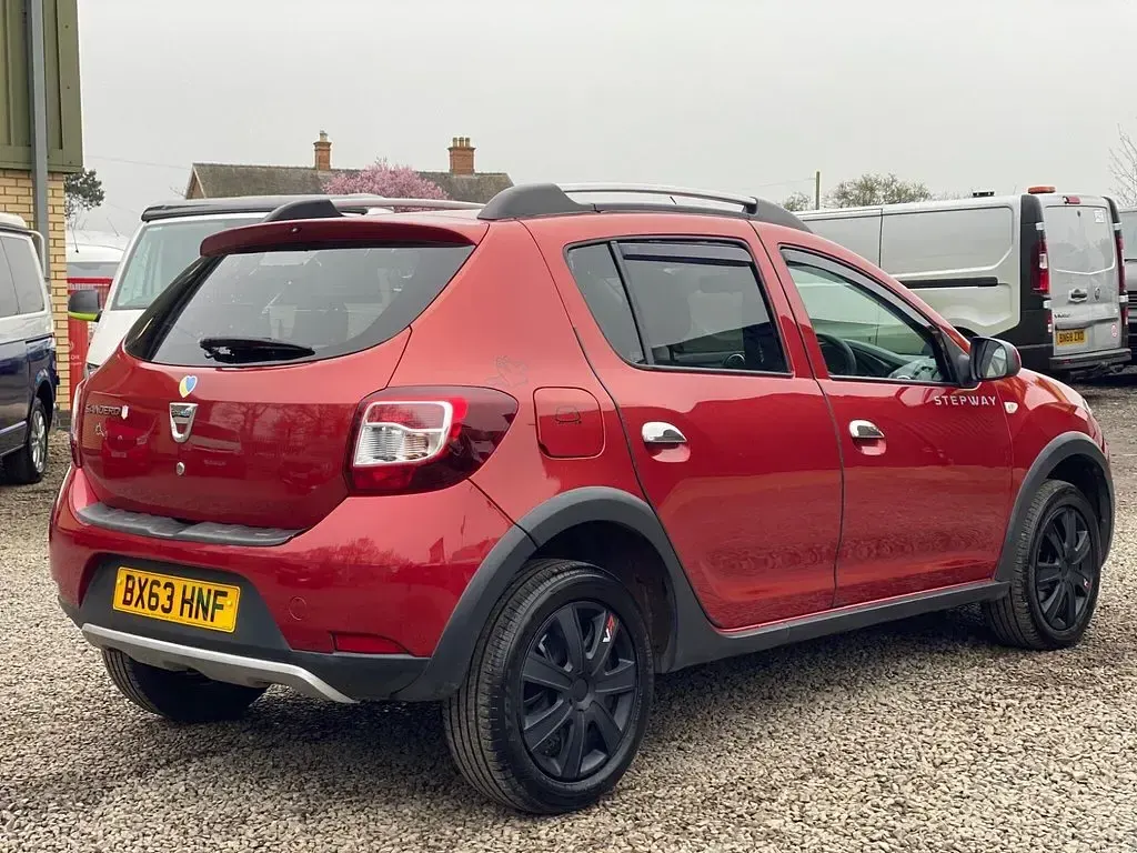 Used Dacia Sandero Ambiance 90 HP (66 kW) 2013 Red Hatchback