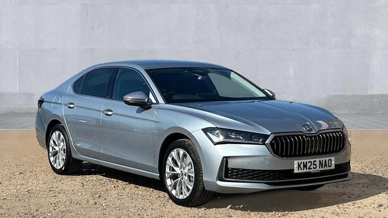 Pebble silver metallic Used 2025 Skoda Superb SE L Hatchback | £30,998 (Expensive) - Image 1/4