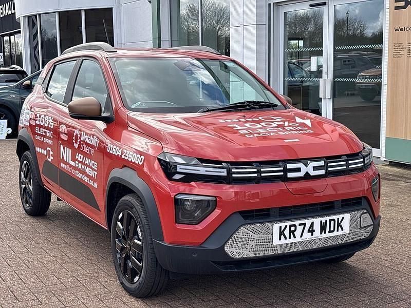 Brick red New 2024 Dacia Spring Extreme Hatchback | £11,995 (Good price) - Image 1/4