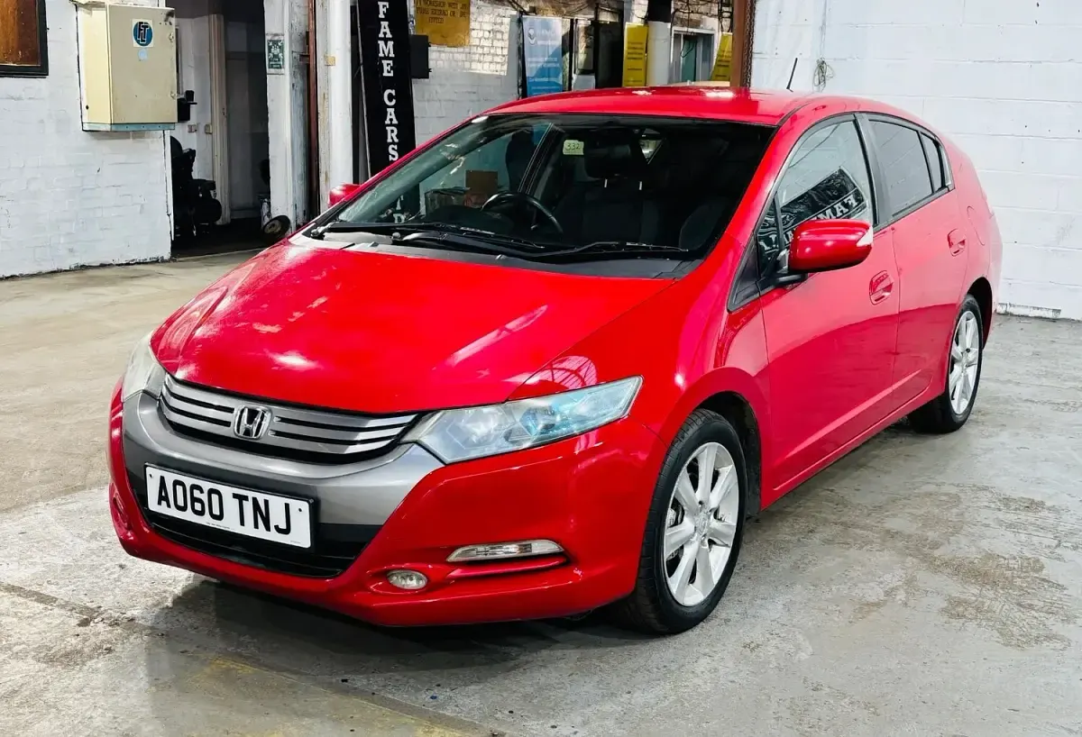 Used Honda Insight Hybrid 102 HP (75 kW) 2011 Red Hatchback