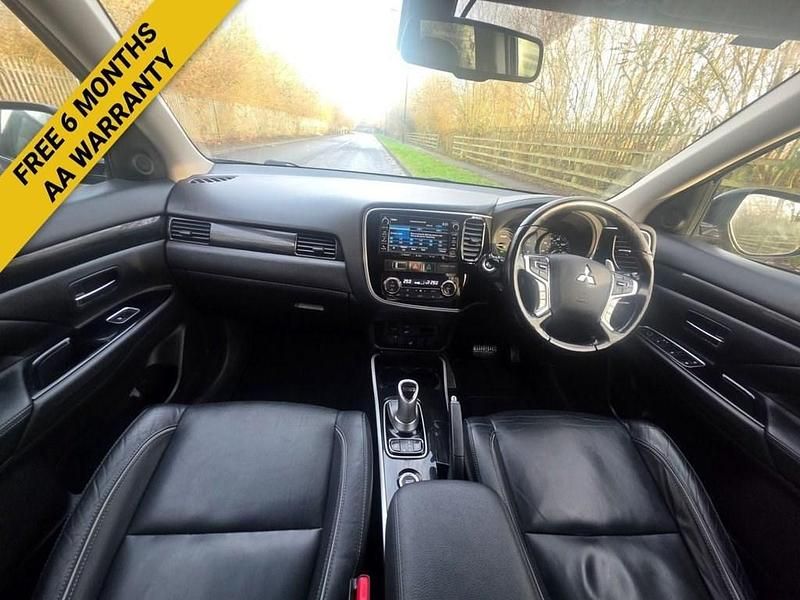 Used Mitsubishi Outlander P-HEV 200 HP (147 kW) 2015 Brown SUV