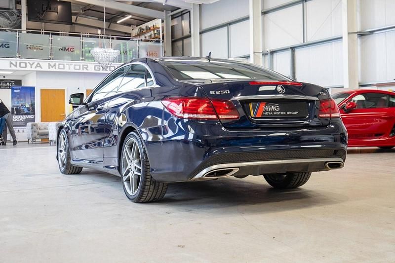 Used Mercedes E250 AMG line 204 HP (150 kW) 2014 Blue Coupe