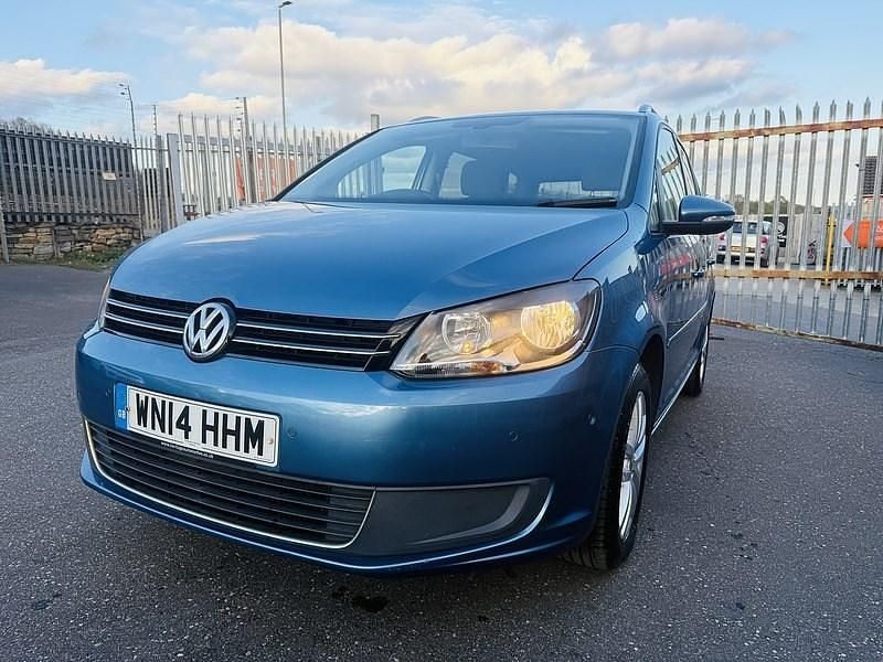 Begagnad VW Touran SE 105 HK (77 kW) 2014 Blå Minibuss