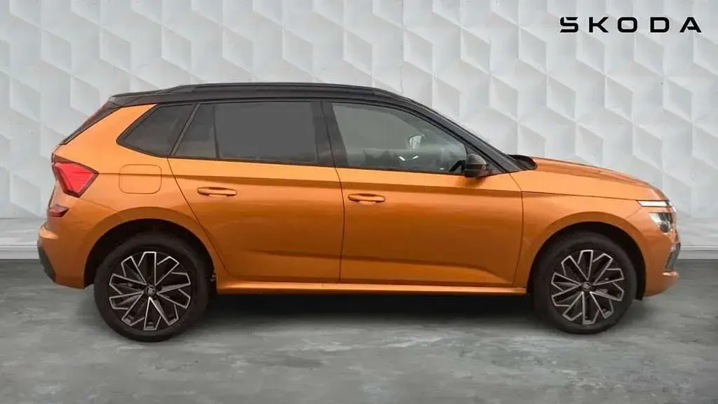 Used Skoda Kamiq Design Edition 116 HP (85 kW) 2026 Phoenix orange metallic black magic pearl effect SUV