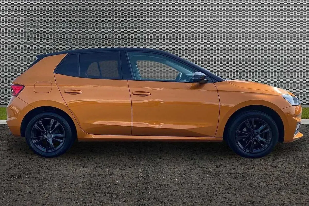 Used Skoda Fabia Colour Edition 59 HP (43 kW) 2022 Phoenix orange metallic black magic pearl effect Hatchback