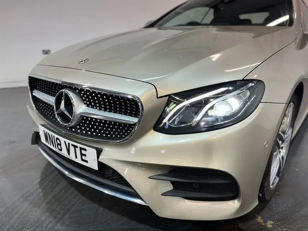 Used Mercedes E220 AMG line 194 HP (142 kW) 2018 Silver Coupe