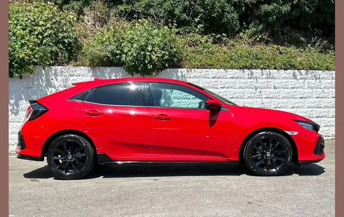 Used Honda Civic Sport 182 HP (133 kW) 2021 Rallye red Hatchback