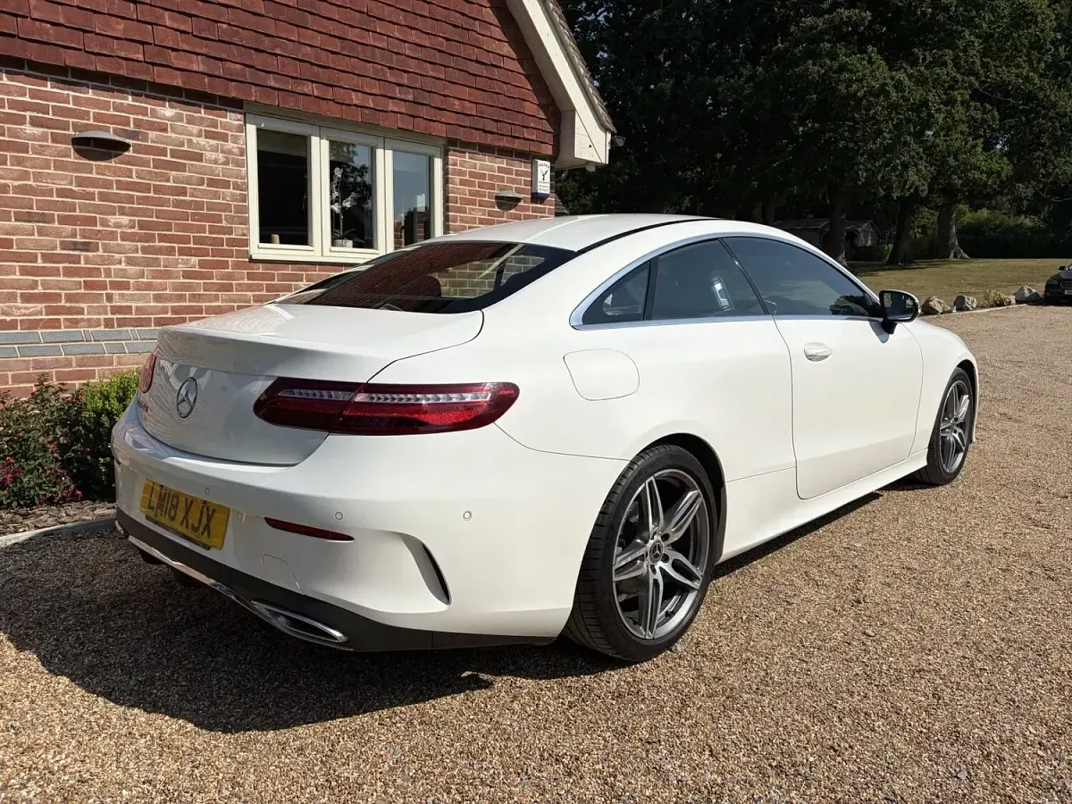 Used Mercedes E220 AMG line 194 HP (142 kW) 2018 White Coupe