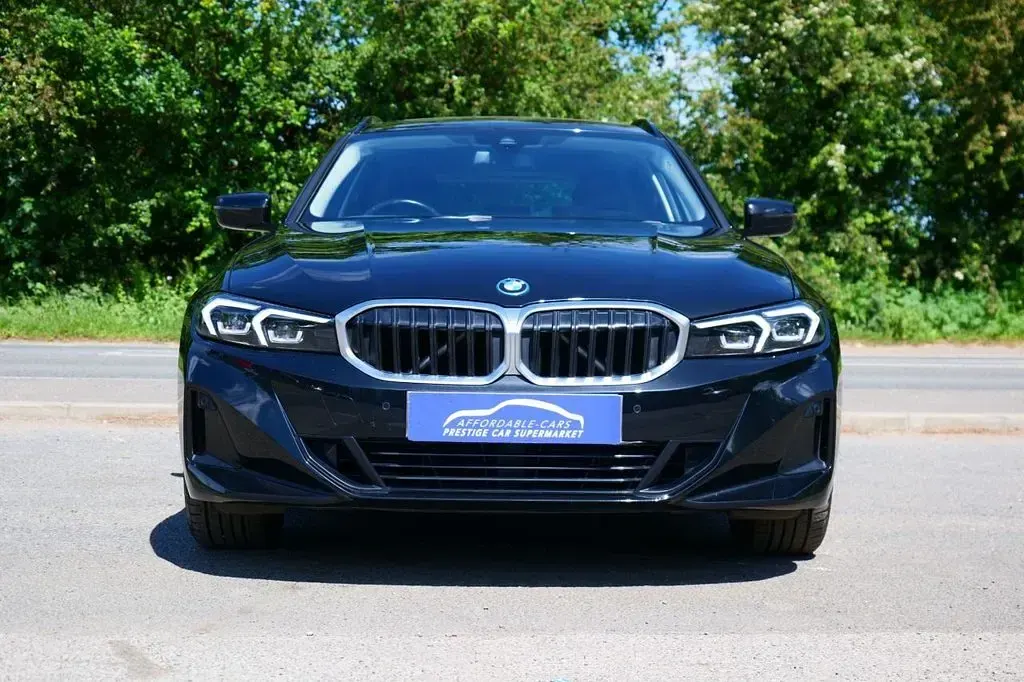Used BMW 330e Sport Line 292 HP (214 kW) 2023 Black Estate