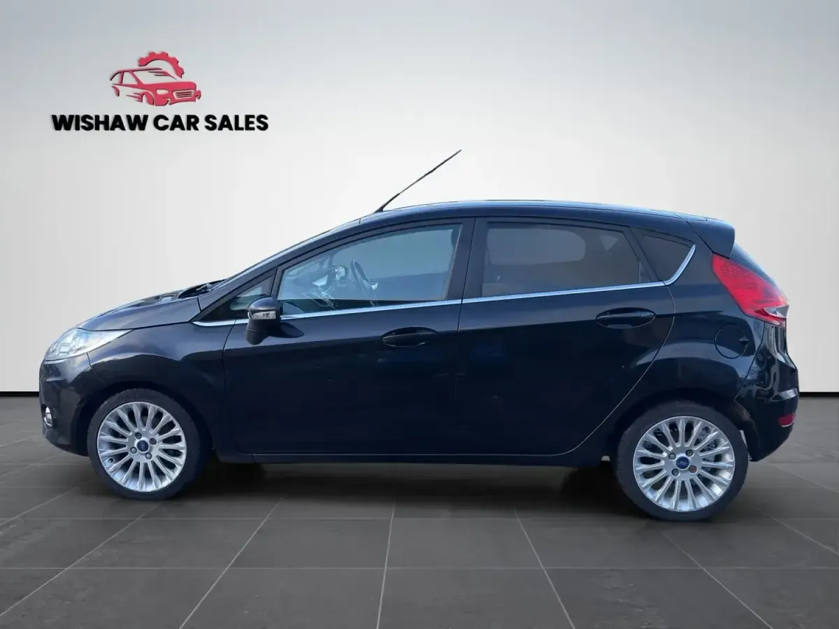 Używany Ford Fiesta Titanium 96 KM (70 kW) 2012 Czarny Hatchback