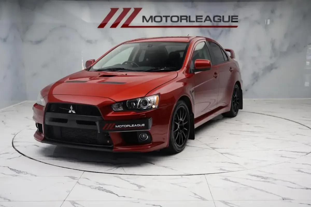 Used Mitsubishi Lancer 240 HP (176 kW) 2011 Red Sedan