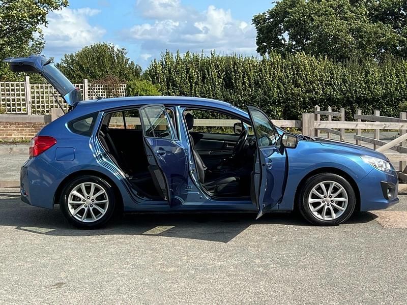 Used Subaru Impreza 114 HP (83 kW) 2014 Blue Hatchback