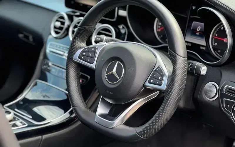 Used Mercedes C250 AMG line 204 HP (150 kW) 2015 Black Estate