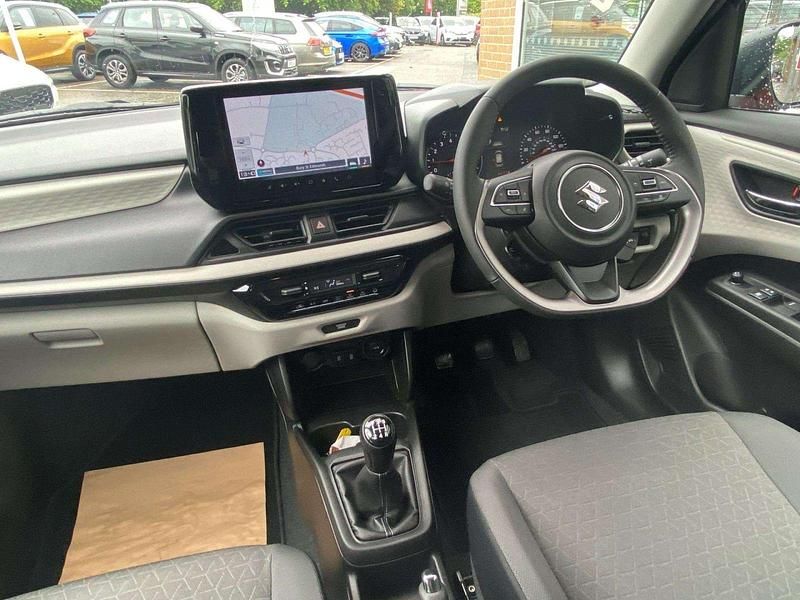 Used Suzuki Swift 82 HP (60 kW) 2025 Burning red pearl metallic Hatchback