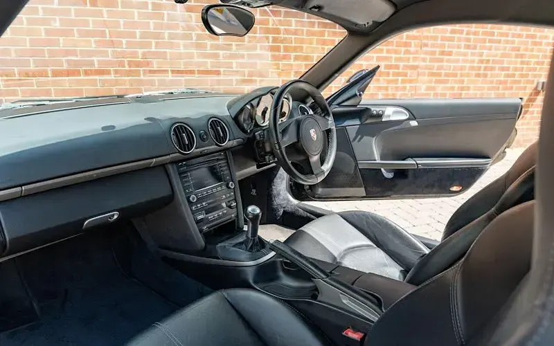 Used Porsche Cayman 265 HP (194 kW) 2010 Black Coupe