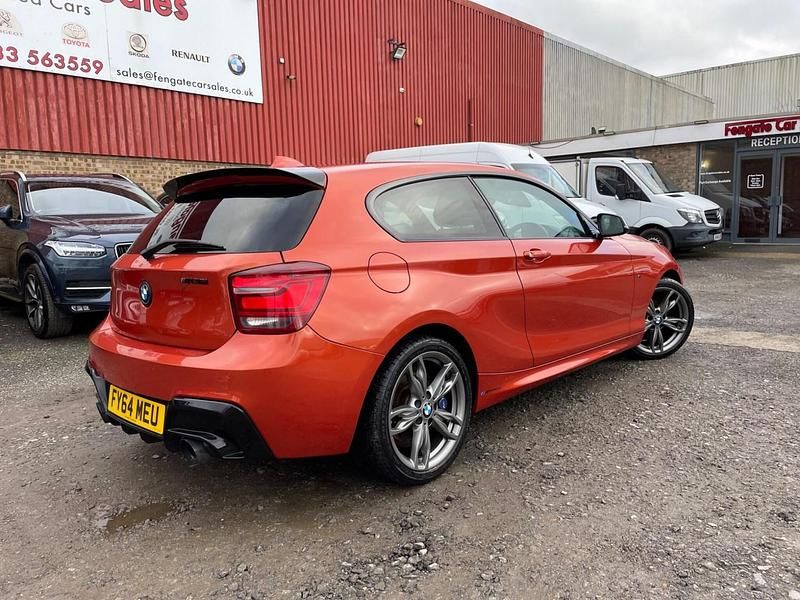 Used BMW M135 Comfort Edition 2014 Orange Hatchback