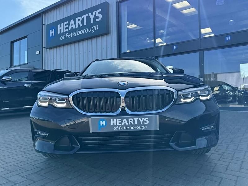 Used BMW 330e Sport Line 292 HP (214 kW) 2021 Black Estate