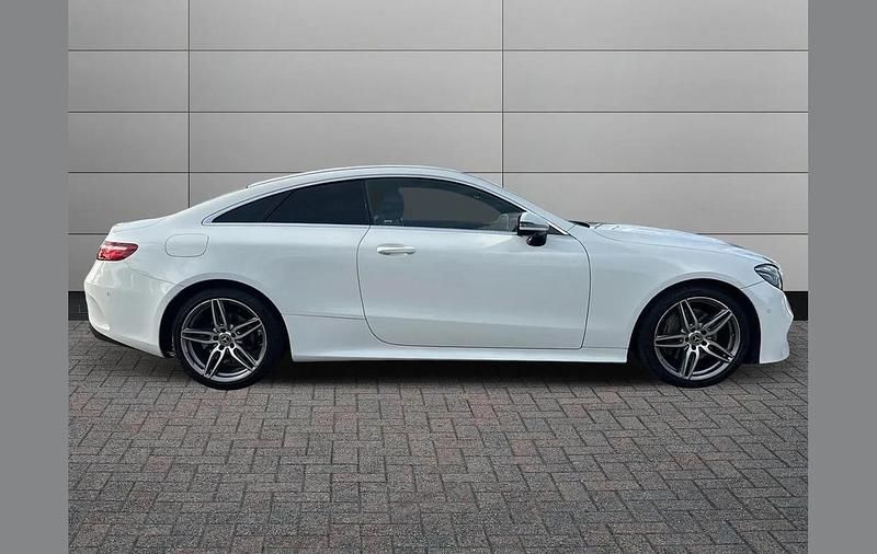 Used Mercedes E220 AMG Line Premium 194 HP (142 kW) 2020 Polar white Coupe