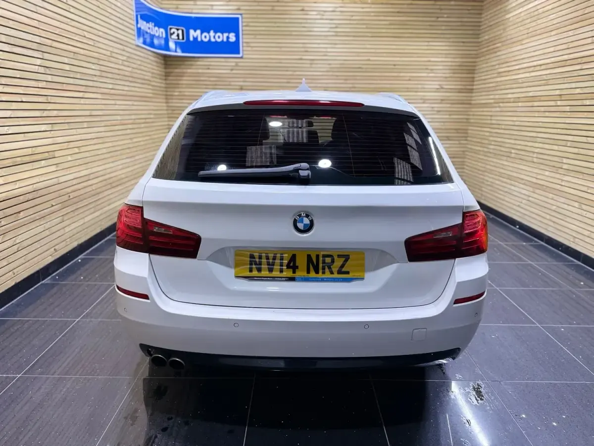 Używany BMW 520 Comfort Edition 190 KM (139 kW) 2014 Biały Kombi