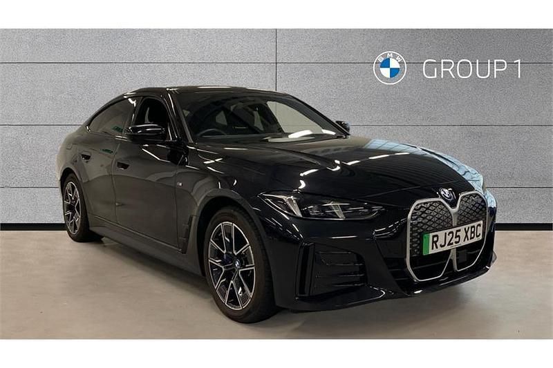 Black sapphire metallic paint Used 2025 BMW i4 M Sport Sedan | £37,650 (Good price) - Image 1/4