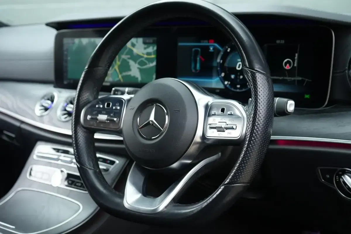 Used Mercedes E220 AMG line 194 HP (142 kW) 2019 Blue Coupe