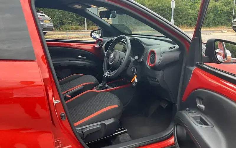 Used Toyota Aygo X 72 HP (52 kW) 2023 Chilli red bitone (pearlescent paint) SUV