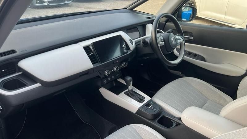 Used Honda Jazz Hybrid 109 HP (80 kW) 2023 Premium paint  shining grey Hatchback