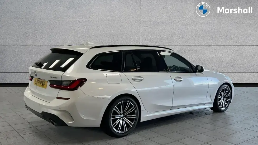 Used BMW 330 M Sport 258 HP (189 kW) 2021 Mineral white metallic Estate