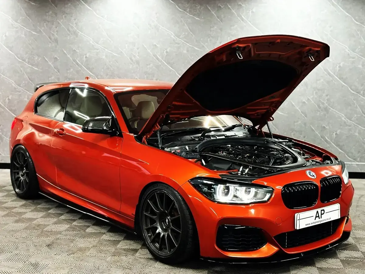 Used BMW M140 M Sport 471 HP (346 kW) 2016 Orange Hatchback