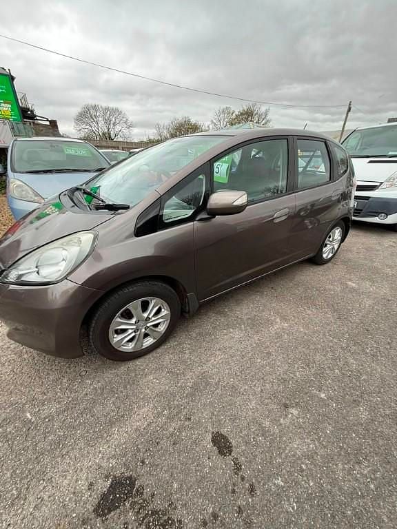 Used Honda Jazz ES 99 HP (72 kW) 2013 Brown Hatchback