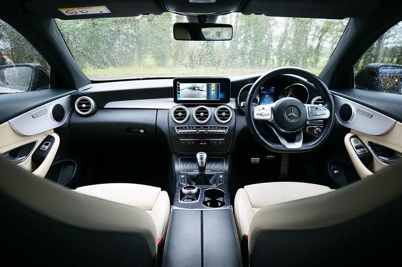 Used Mercedes C180 AMG line 156 HP (114 kW) 2019 White Coupe