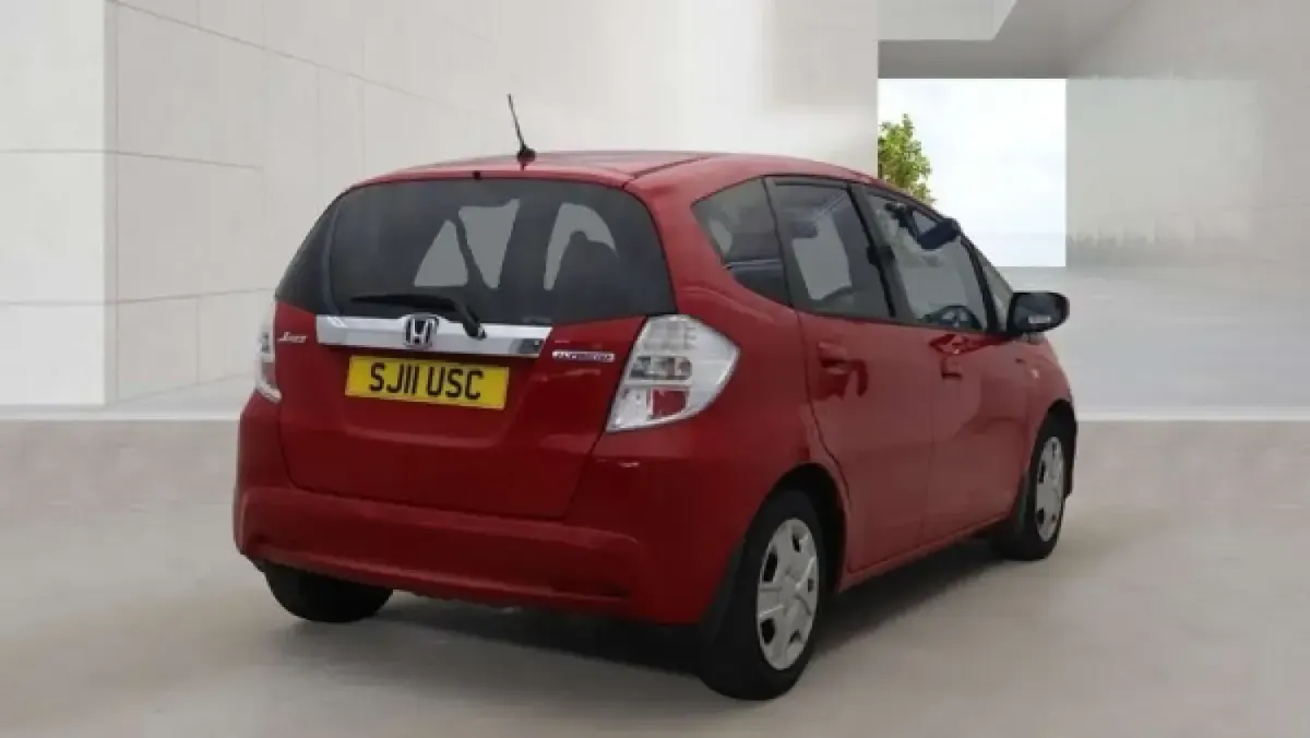 Used Honda Jazz Hybrid 102 HP (75 kW) 2011 Red Hatchback