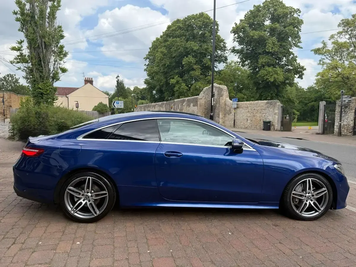 Used Mercedes E220 AMG Line Premium 194 HP (142 kW) 2020 Blue Coupe