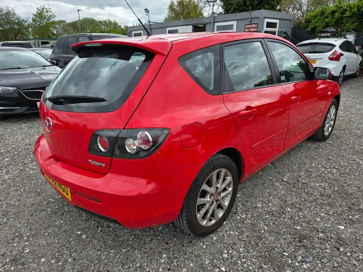 Używany Mazda 3 Takara 105 KM (77 kW) 2009 Czerwony Hatchback