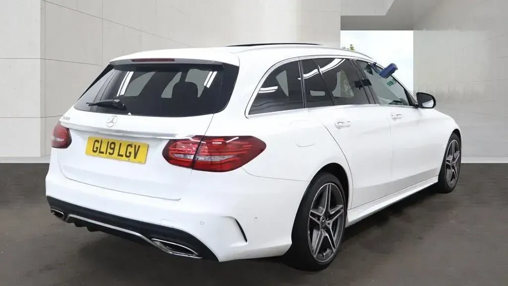 Used Mercedes C200 AMG line 198 HP (145 kW) 2019 White Estate