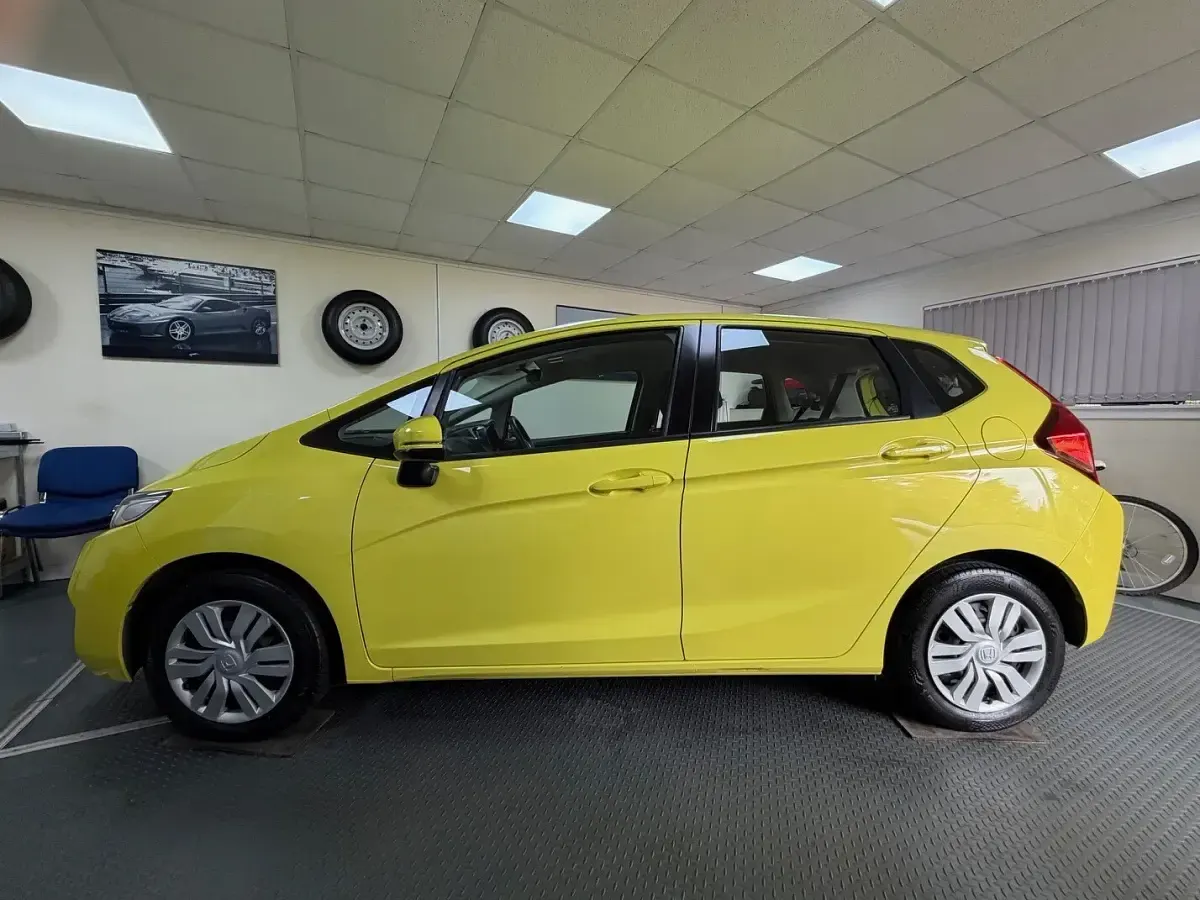 Used Honda Jazz S 102 HP (75 kW) 2016 Yellow Hatchback
