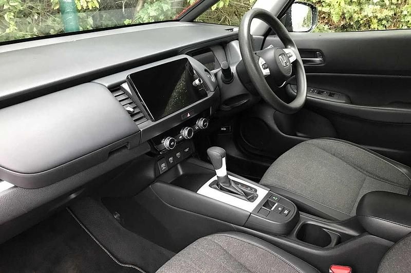 Used Honda Jazz Hybrid 109 HP (80 kW) 2023 Premium crystal red Hatchback