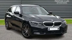 Black Used 2021 BMW 330e Sport Line Estate | £18,991 (Fair price)
