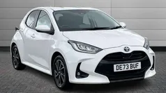 Pure white Used 2023 Toyota Yaris Hybrid Design Hatchback | £17,450 (Fair price)