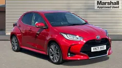 Scarlet flare (pearlescent paint) Used 2021 Toyota Yaris Hybrid Hatchback | £17,024 (Fair price)