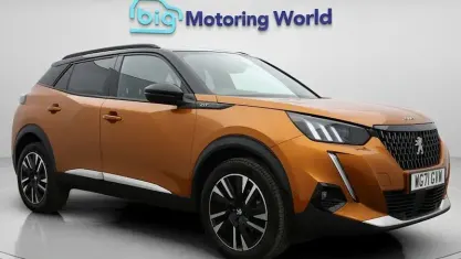 Second-hand Peugeot 2008 Premium 155 CP (114 kW) 2021 Portocaliu SUV