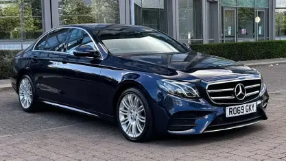 Used Mercedes E220 AMG line 194 HP (142 kW) 2019 Blue Sedan